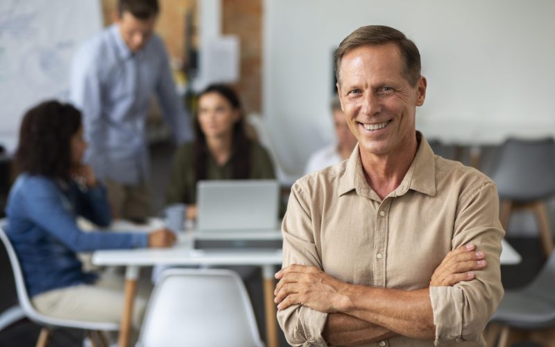close-up-smiling-person-conference-room